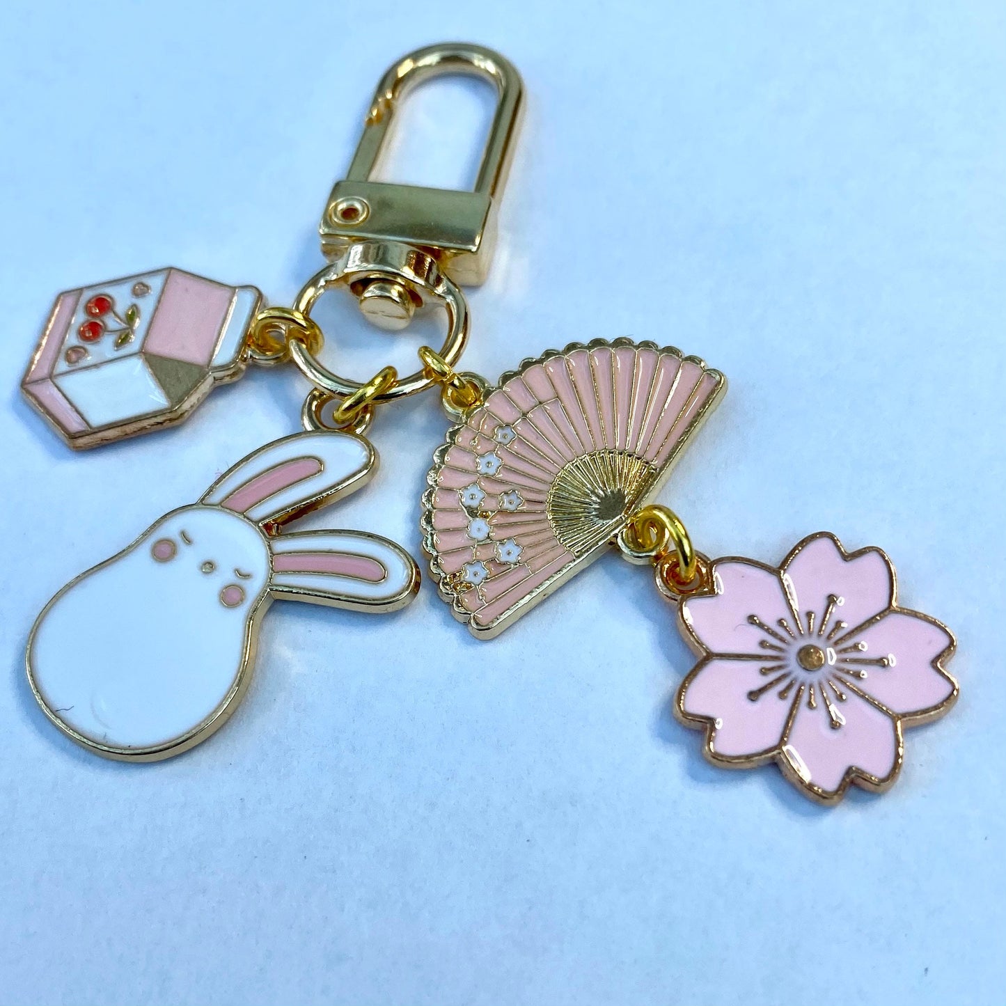 Sleepy anime bunny cherry milk carton fan sakura flower keyring