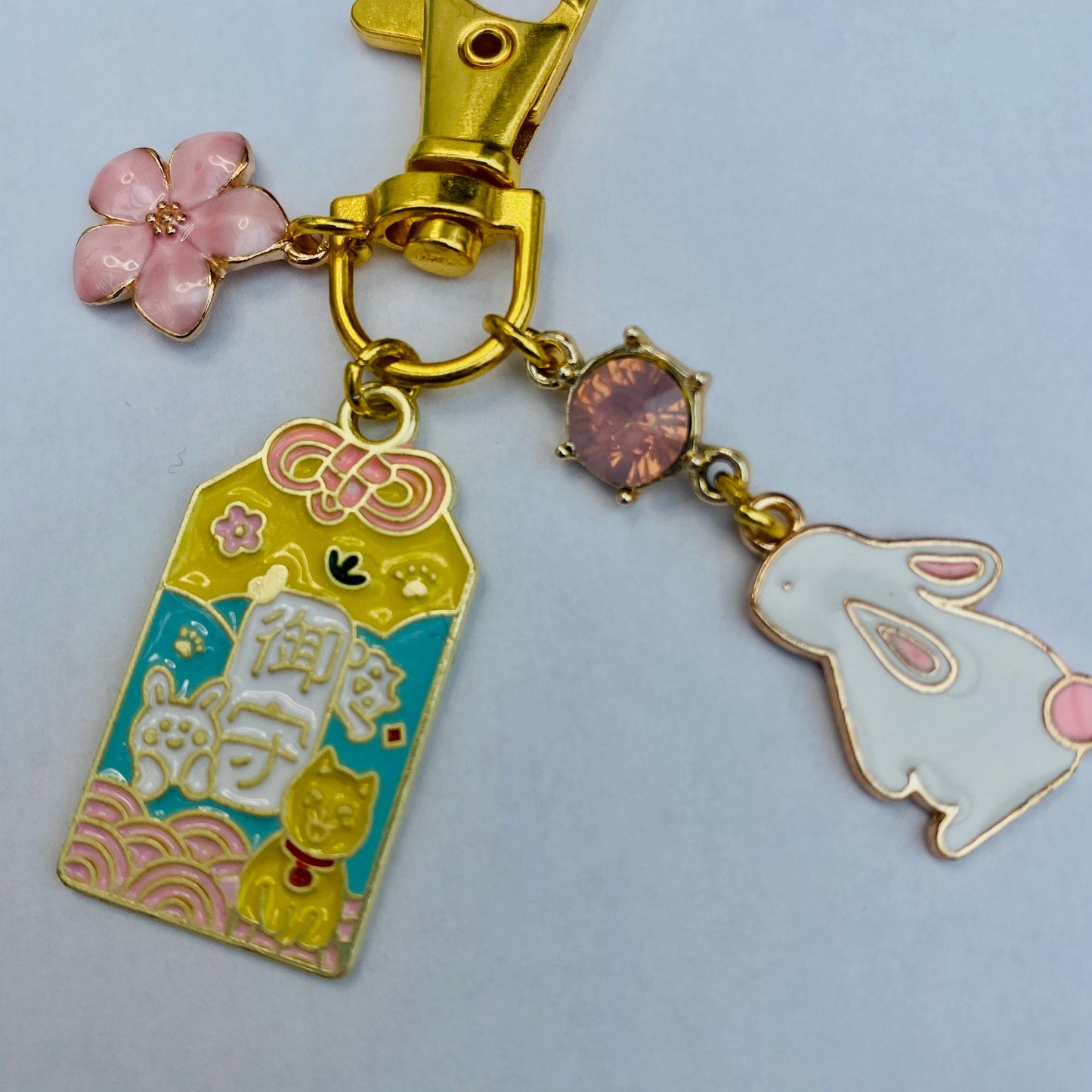 Japanese pink Omamori bunny moon sparkle gem keyring with flower charm