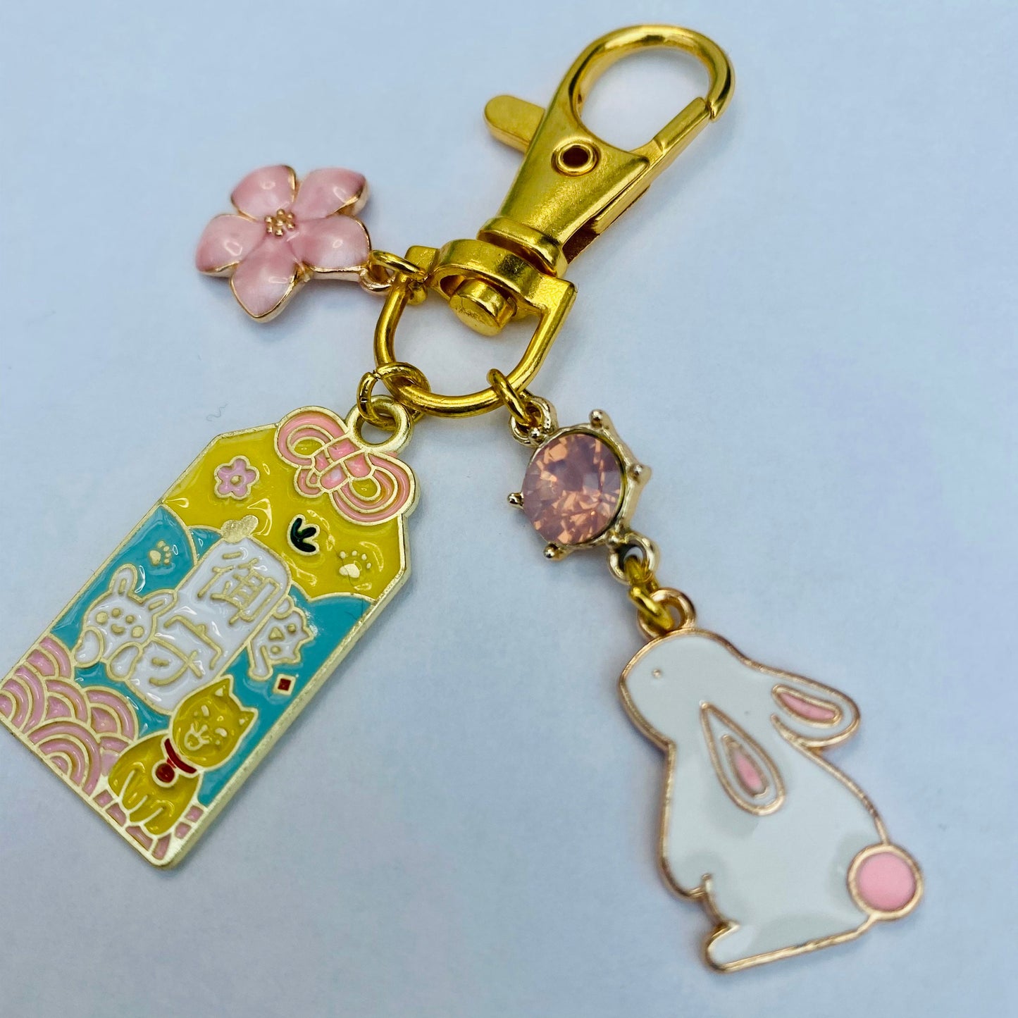 Japanese pink Omamori bunny moon sparkle gem keyring with flower charm