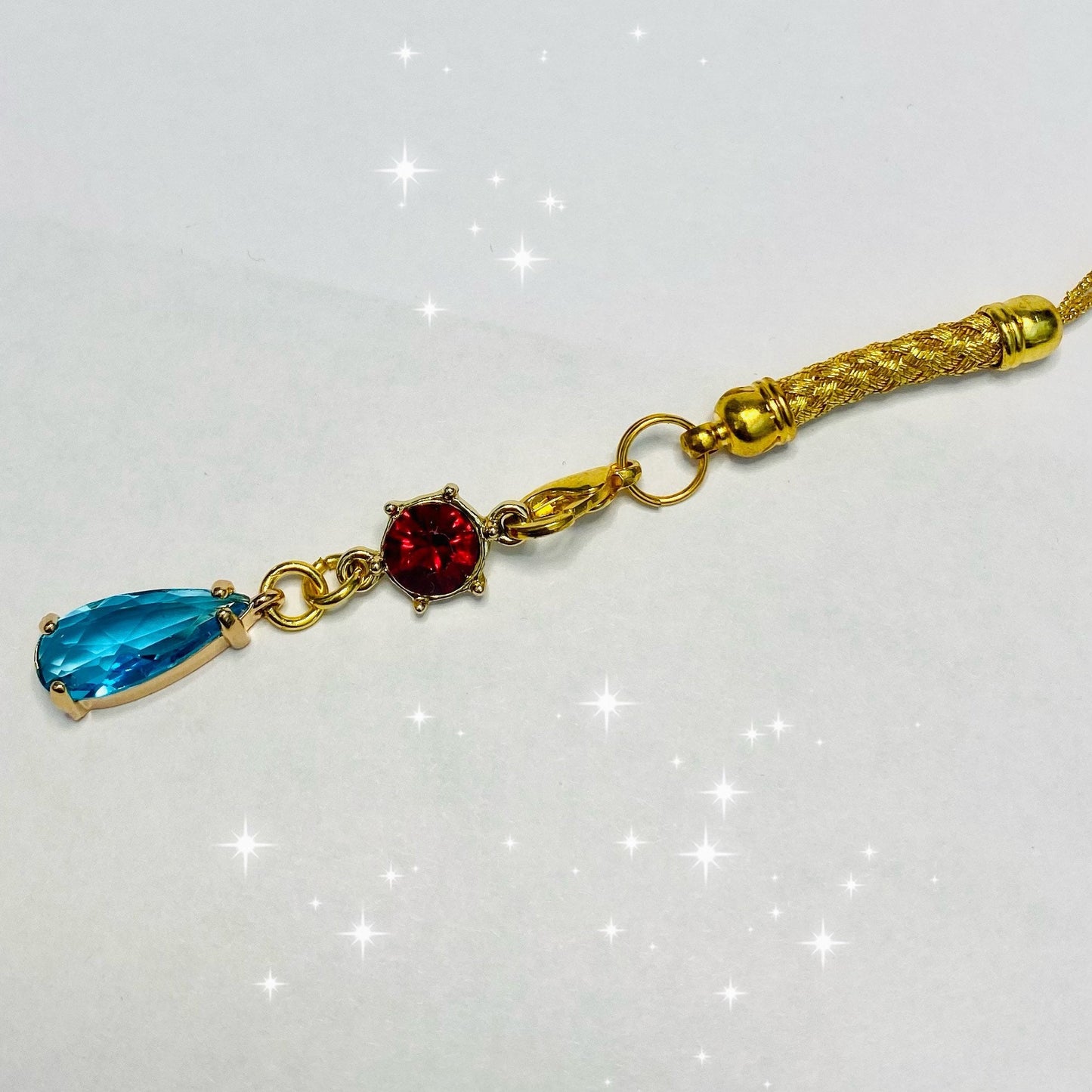 Two gem anime  red blue crystal phone charm gold rope 