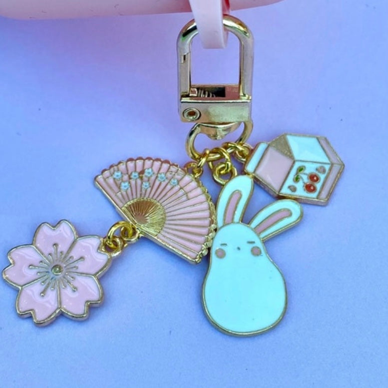 Sleepy anime bunny cherry milk carton fan sakura flower keyring